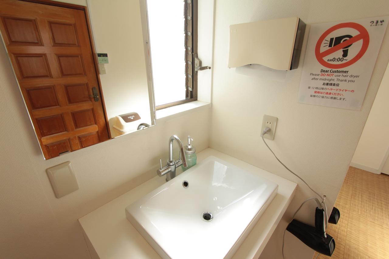 Tsuruya Guesthouse Hiroshima Bagian luar foto